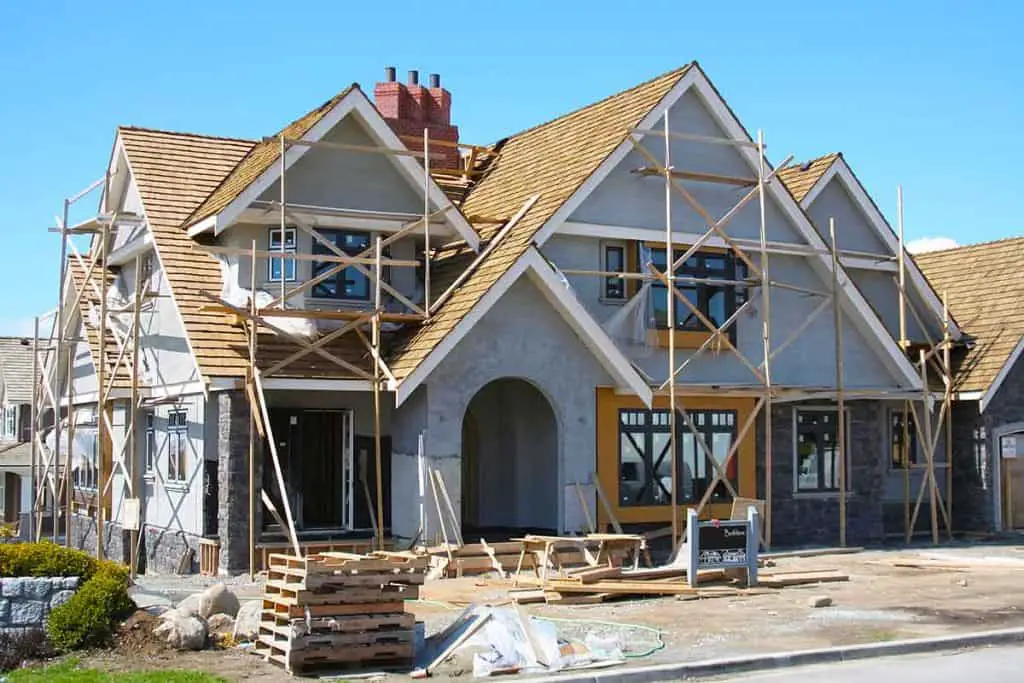 pros and cons of building your own house